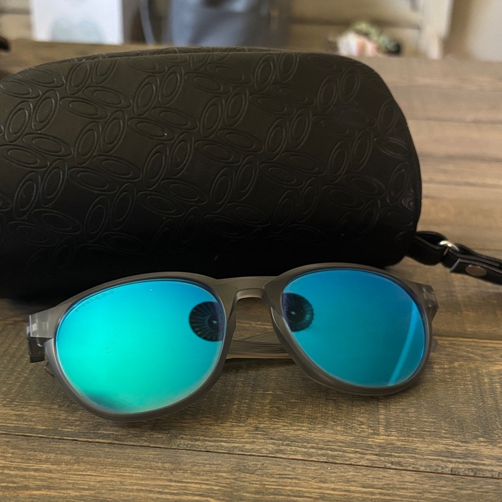Oakley Gray Sunglasses with Blue Lenses
